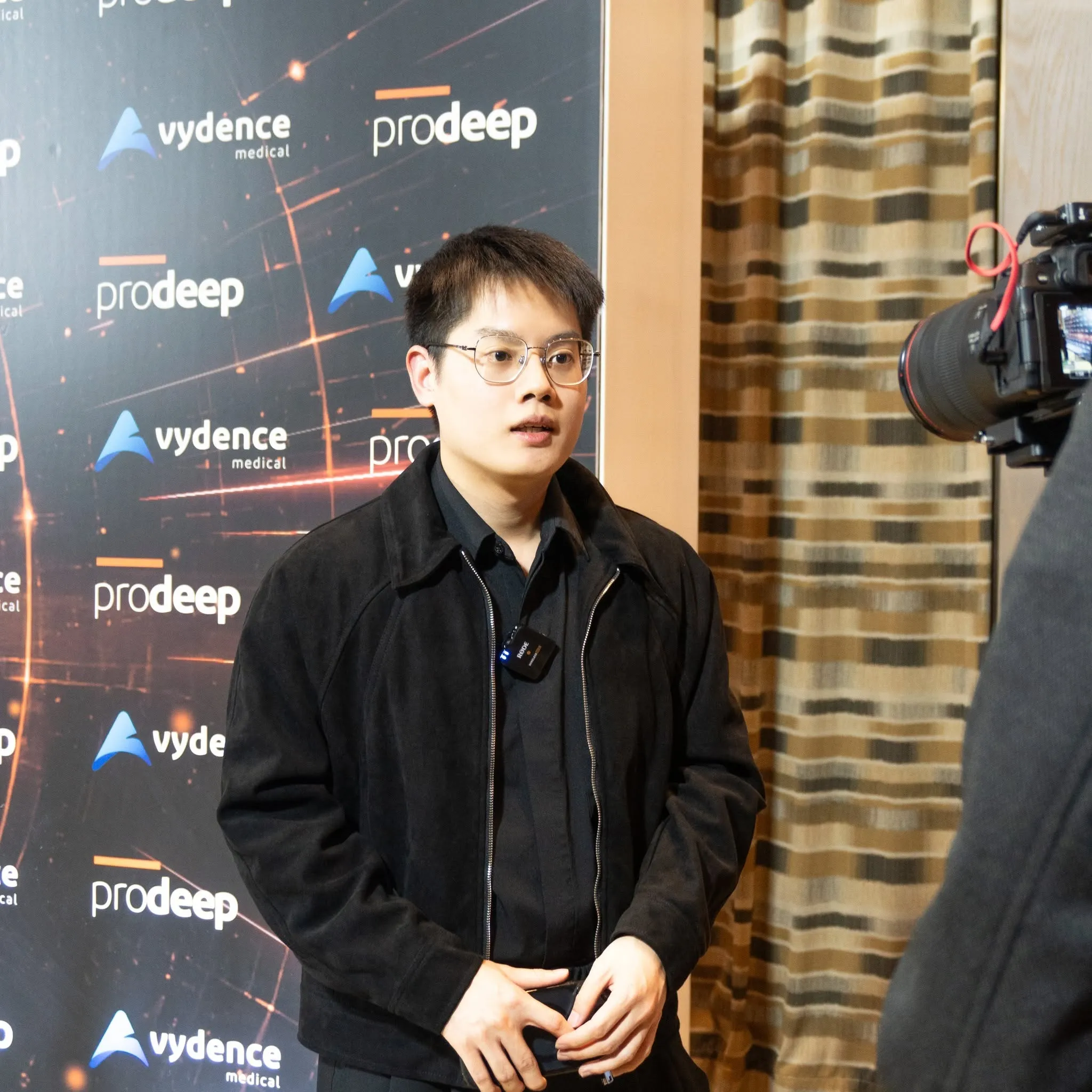 Dr. Yotsawat Laojirakorn giving an interview on advanced beauty innovations at Zeniq Holistic